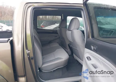 2015 Toyota Tacoma Base V6 z USA, uszkodzony, nr VIN 3TMLU4EN1FM201554